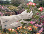 action shot of the Rose Gauntlet elbow-length women's gardening gloves